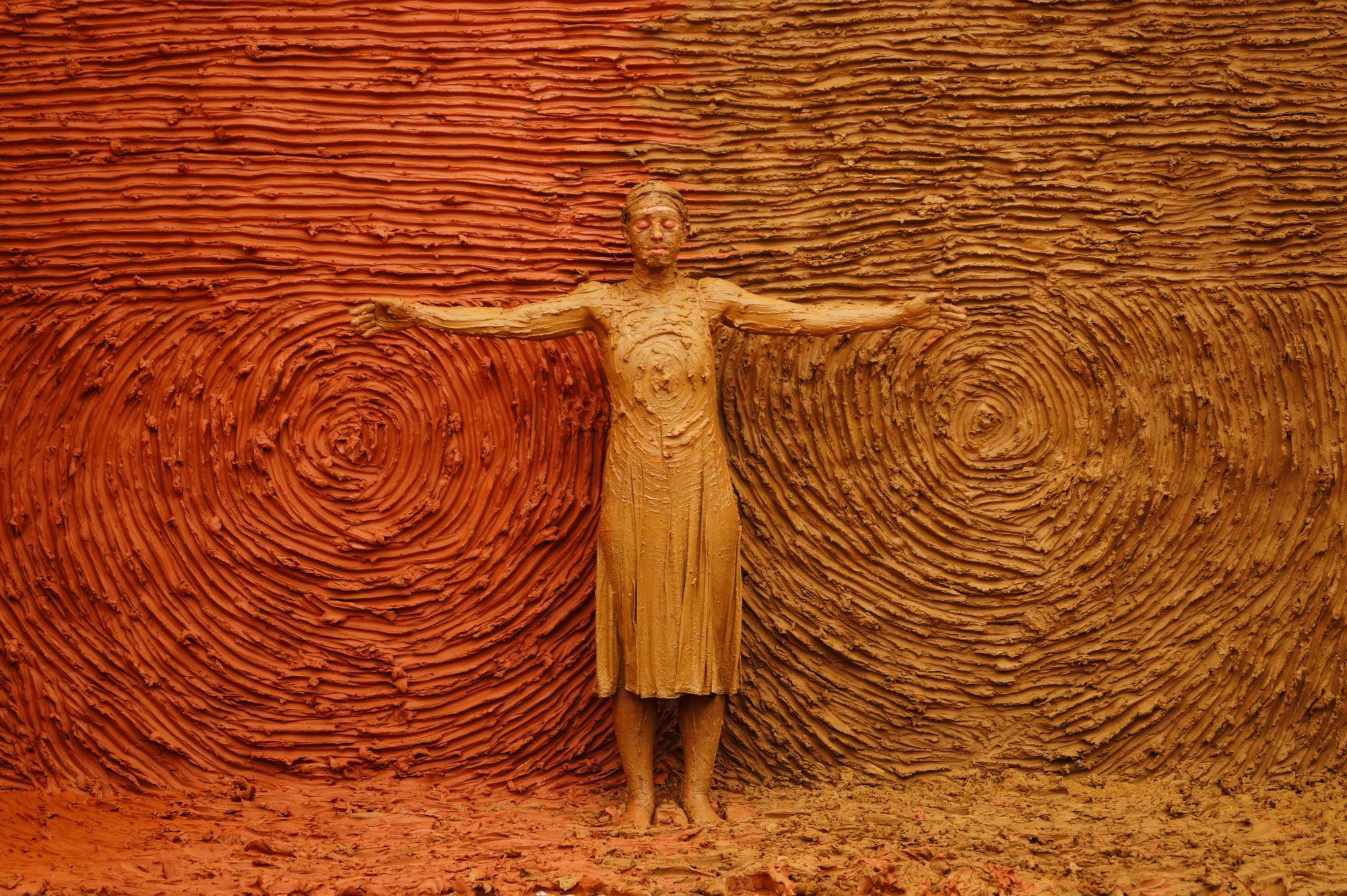 Anindita Dutta, wet-clay wall relief with the body
